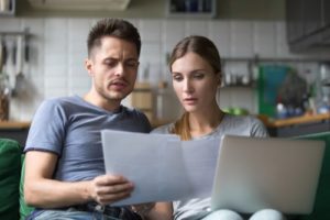 couple looking over bankruptcy documents
